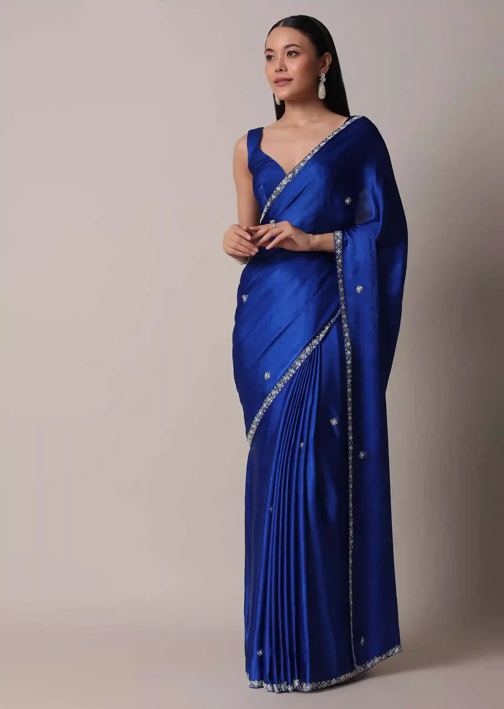 Royal Sapphire Satin Saree with Stone Embellished Border – Luxury Trade Trend Edition